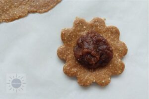 Date Hamantashen Recipe - Purim -Filling On Dough Circle