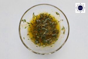Savory Accordion Potatoes Recipe - Thyme Olive Oil Garnish