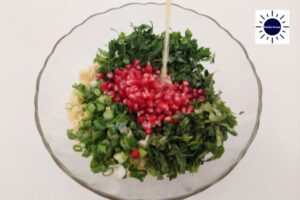 Mediterranean Pomegranate Bulgur Salad - Tabouli - Pour Dressing Over Salad