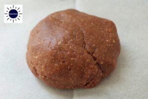 A Ball Of Hamantashen Dough On A Baking Sheet.