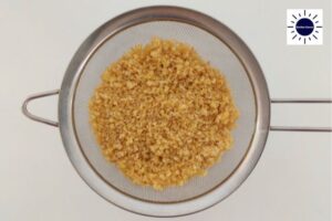 Bulgur In Sifter Prepared Following This Mediterranean Savory Bulgur Recipe.