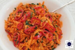 Tossing The Salad Base And Dressing In A Large Bowl With A Large Tablespoon.