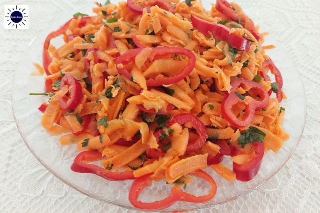 Mediterranean Sweet Pepper Carrot Salad In Glass Serving Bowl On Decorative Lace Cloth.