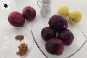 Mediterranean Lemony Beet Salad Ingredients On A Glass Dish And On A Table.