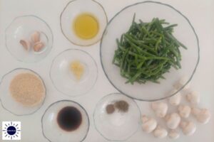 Mediterranean Savory Mushroom Green Beans Ingredients Arranged In Glass Bowls With The Kosher Create Sun Logo In The Lower Left Corner.