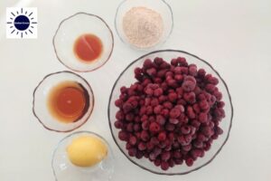 The Cherry Filling Ingredients Arranged In Glass Bowls With The Kosher Create Sun Logo In The Upper Left Side.